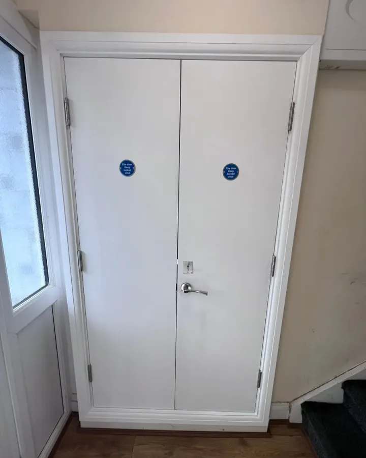 Job 3 after: new fire-rated meter cupboard doors by Enclose