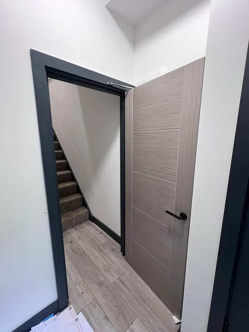 Fire door and frame being maintained