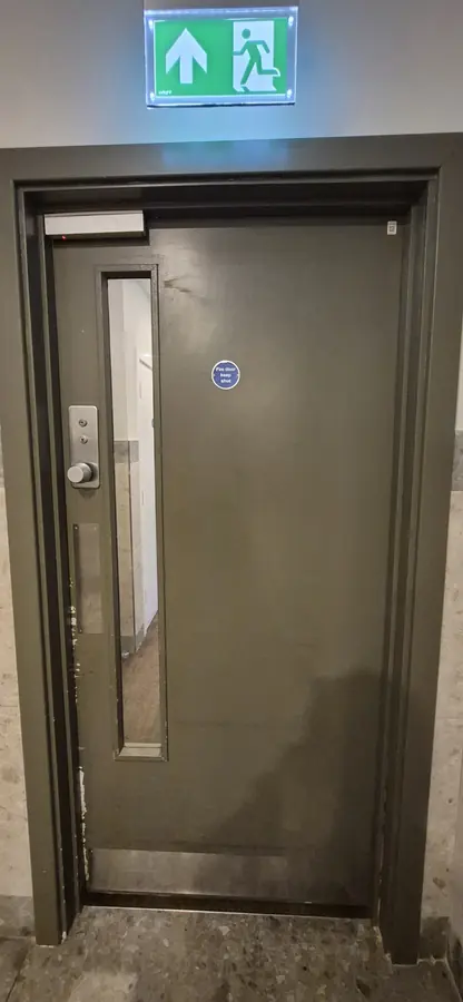 New fire door with Fire Door Keep Shut signage