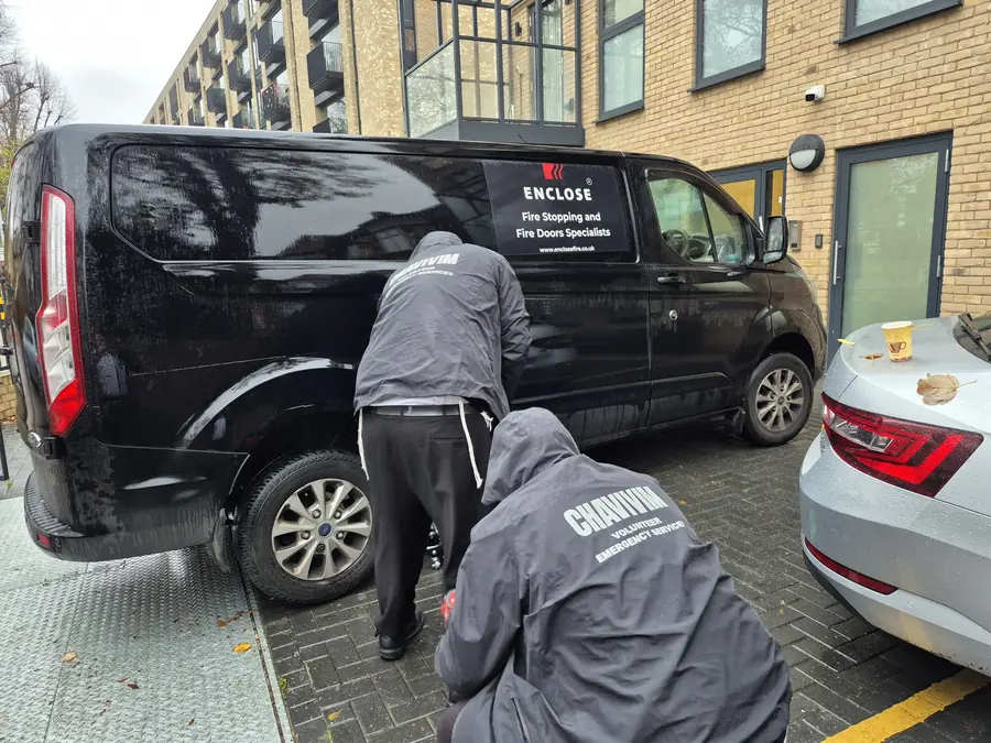 Enclose vans and crew arriving on site